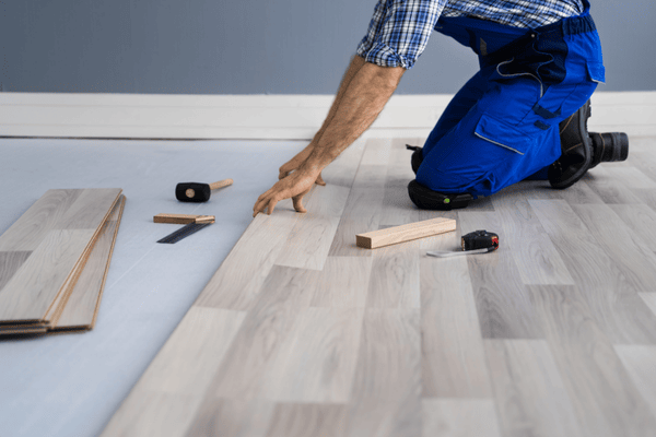 best flooring options- contractor installing wood floors